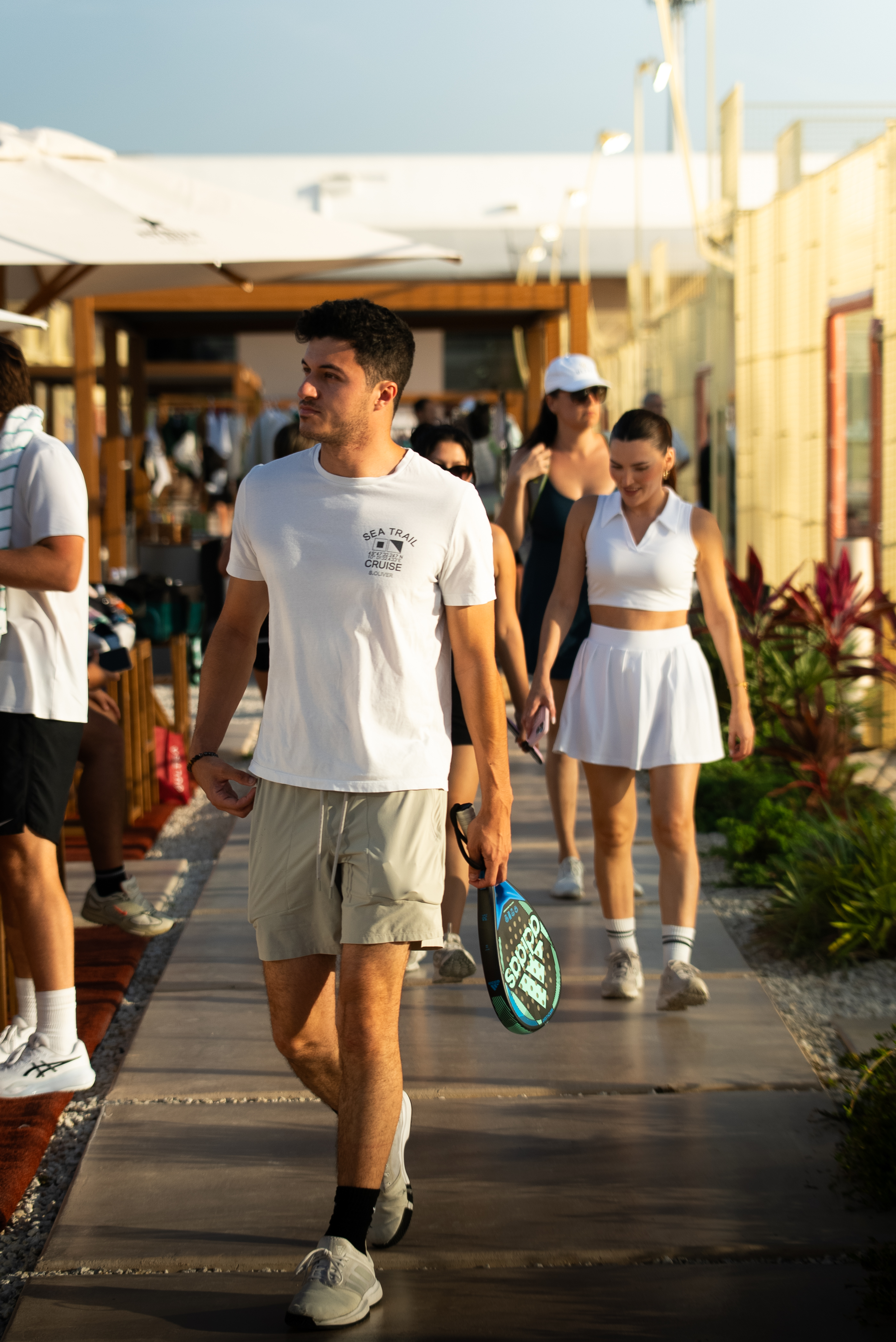 Members arriving at Ultra Padel Miami at golden hour